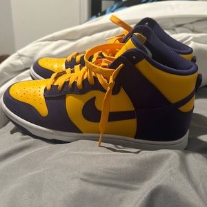 Yellow and purple high top Nike dunks